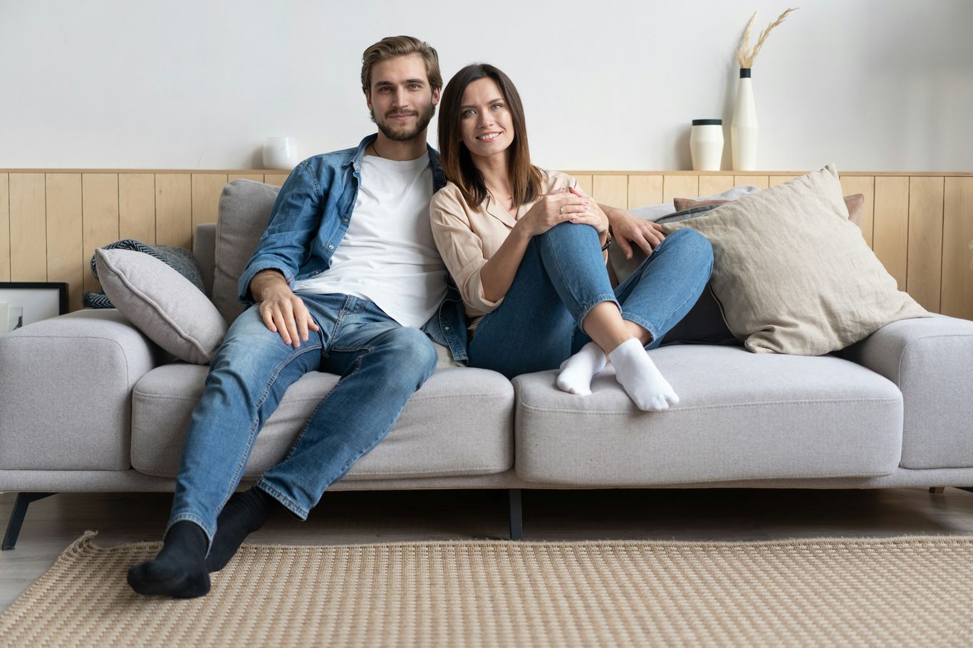 embracing-happy-couple-bedroom-celebrating-new-home