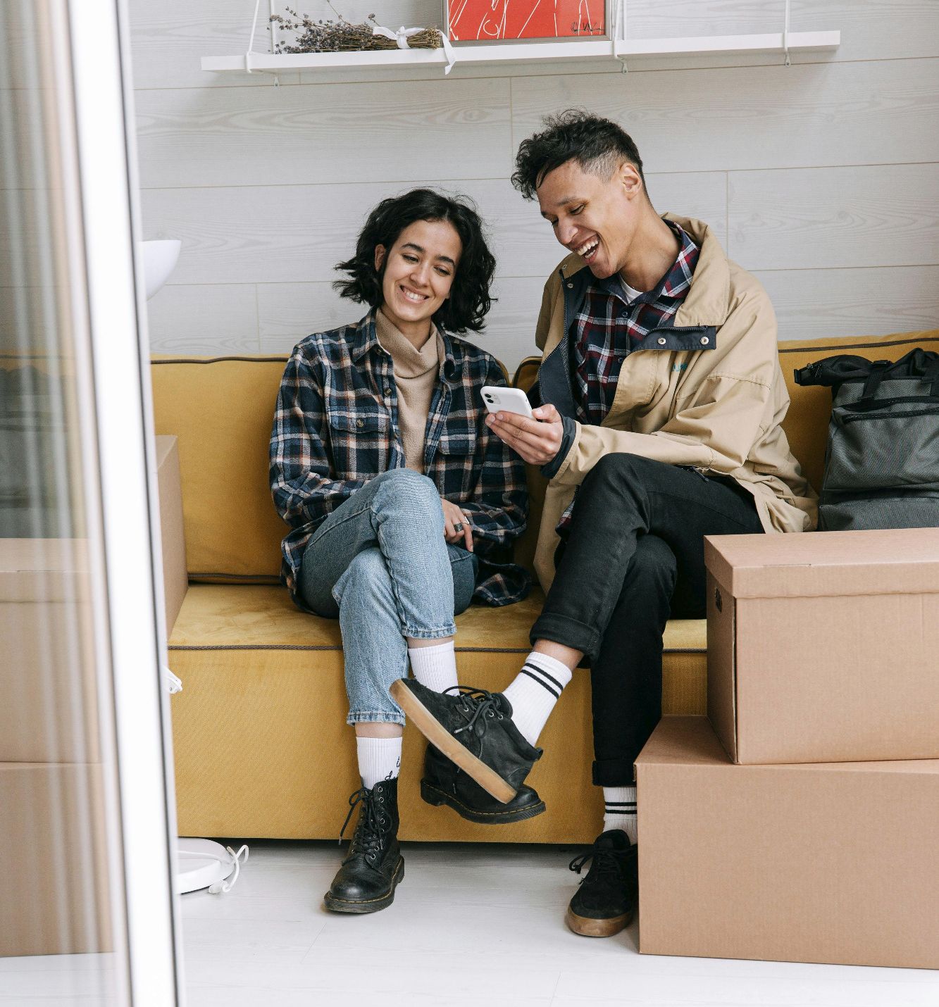 embracing-happy-couple-bedroom-celebrating-new-home